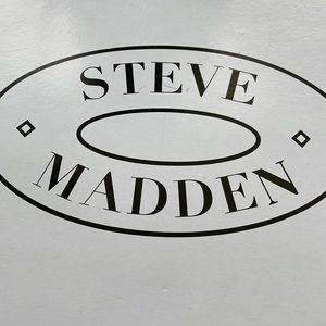 Used silver Steve Madden sneakers